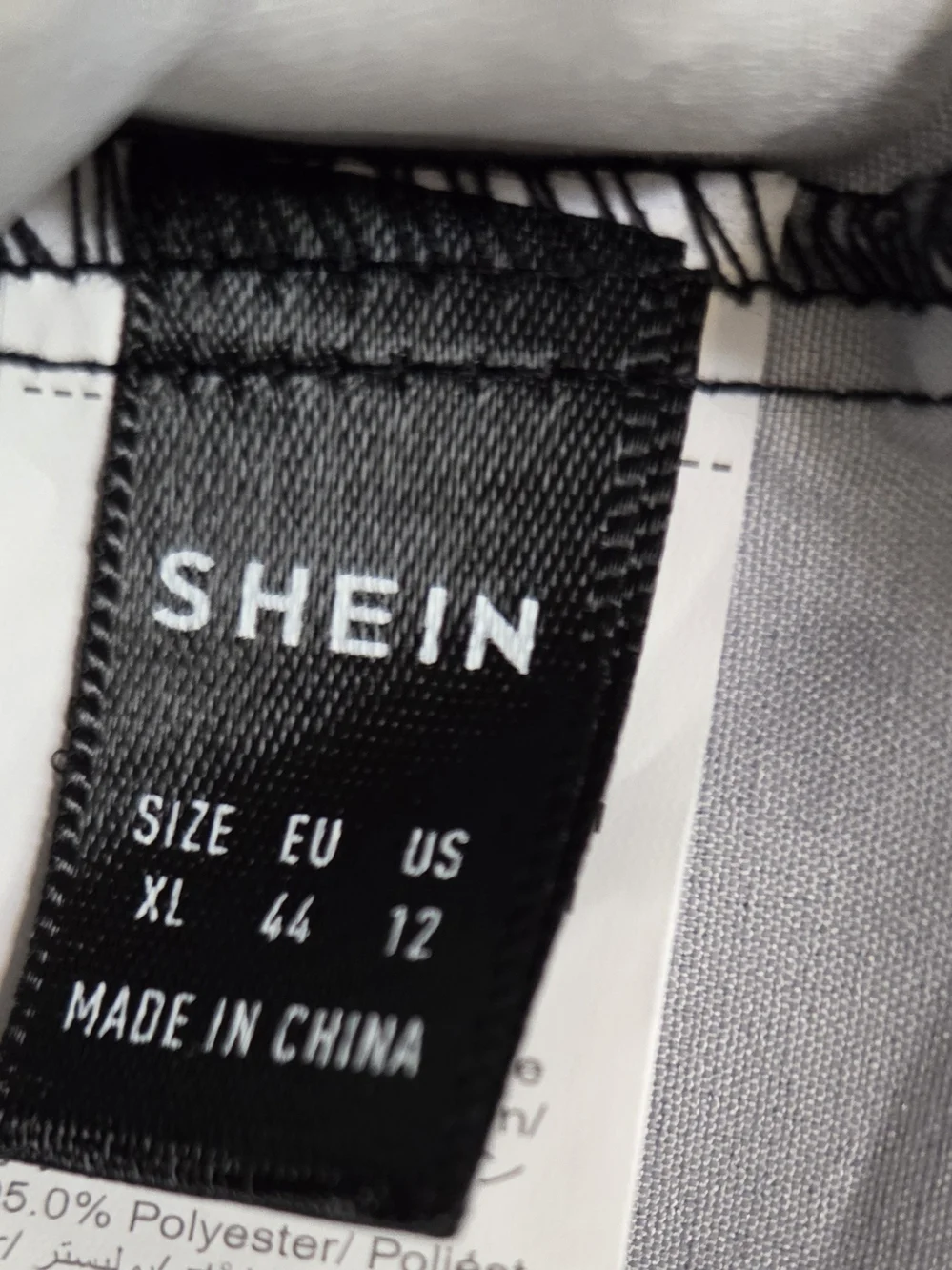 SHEIN Black and White Floral V-Neck Blouse - Picture 2 of 2